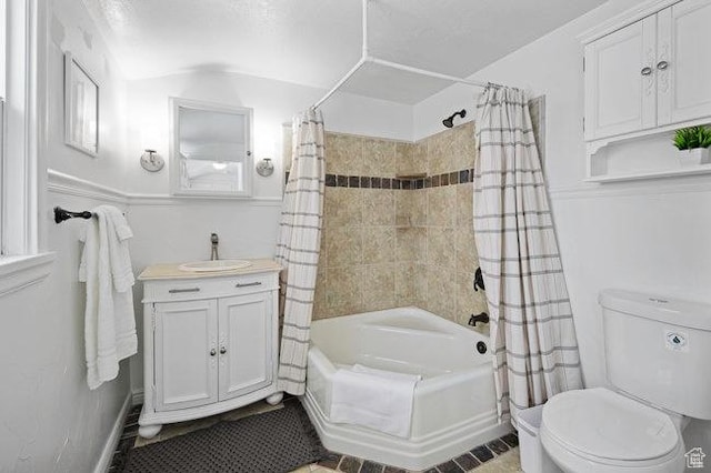 575 N 300 E, Tremonton, UT 84337 - bathroom with vanity, shower / bath combination with curtain, toilet, baseboards, and tile patterned flooring