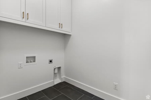 5291 W 3775 S Unit 22, Hooper, UT 84315 - laundry area featuring cabinets, hookup for a washing machine, hookup for an electric dryer, and dark tile patterned flooring