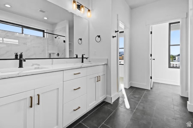 5291 W 3775 S Unit 22, Hooper, UT 84315 - bathroom with vanity, a shower with door, and tile patterned flooring