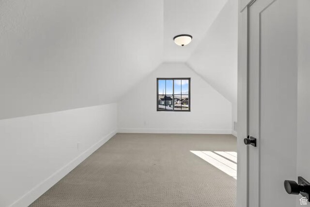 5291 W 3775 S Unit 22, Hooper, UT 84315 - additional living space featuring lofted ceiling and light carpet