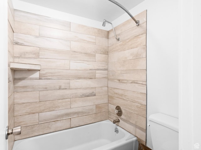 425 S 1000 E Unit 203C, Salt Lake City, UT 84102 - bathroom featuring tiled shower / bath and toilet