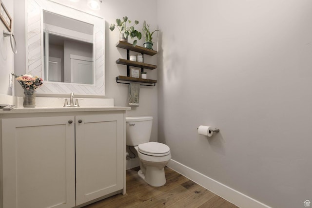 717 S 775 W, Hurricane, UT 84737 - bathroom featuring hardwood / wood-style flooring, vanity, and toilet