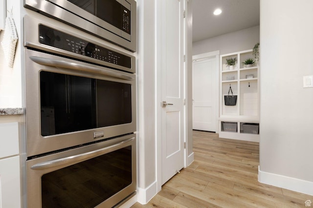 717 S 775 W, Hurricane, UT 84737 - kitchen featuring appliances with stainless steel finishes and light wood-type flooring