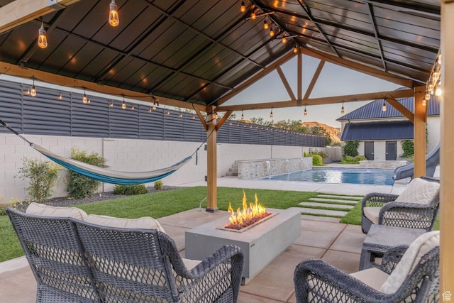 717 S 775 W, Hurricane, UT 84737 - view of patio / terrace with a fenced in pool, a fire pit, and a gazebo