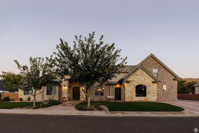 717 S 775 W, Hurricane, UT 84737 - view of front facade featuring a lawn