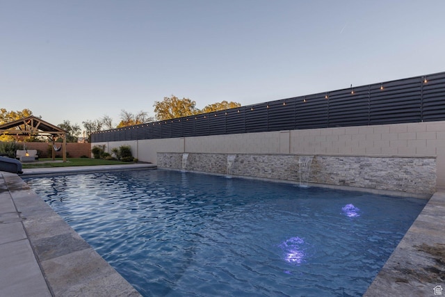 717 S 775 W, Hurricane, UT 84737 - pool at dusk with a gazebo