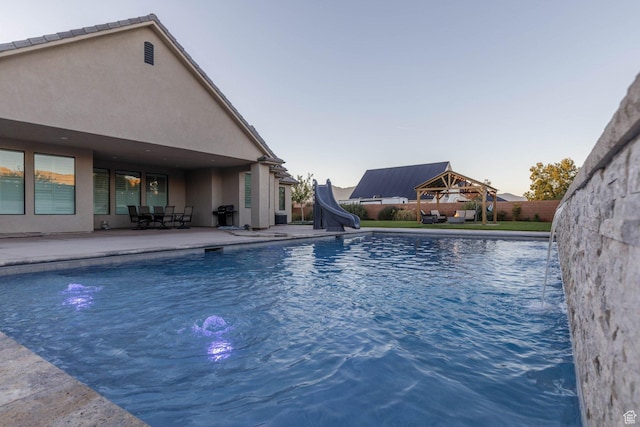 717 S 775 W, Hurricane, UT 84737 - view of pool featuring a gazebo, a water slide, and a patio area