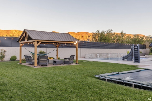 717 S 775 W, Hurricane, UT 84737 - view of yard featuring a mountain view, a gazebo, and a patio area