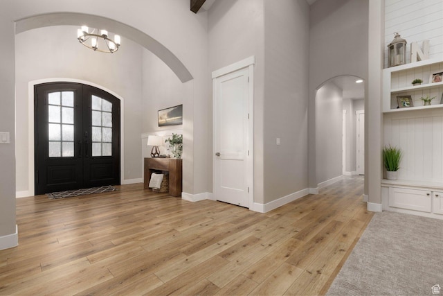 717 S 775 W, Hurricane, UT 84737 - foyer entrance featuring french doors, a chandelier, light hardwood / wood-style floors, and a high ceiling
