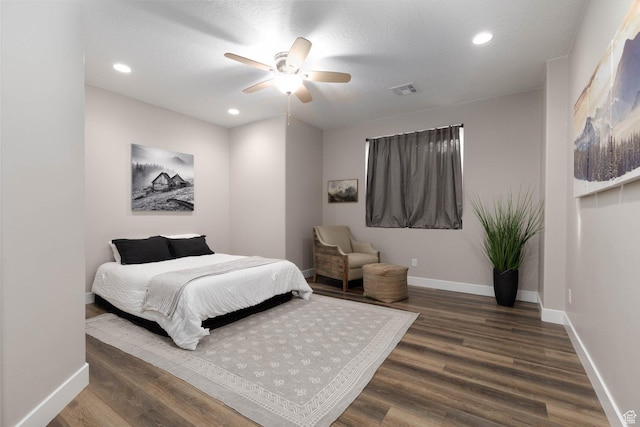 717 S 775 W, Hurricane, UT 84737 - bedroom featuring hardwood / wood-style flooring, a textured ceiling, and ceiling fan