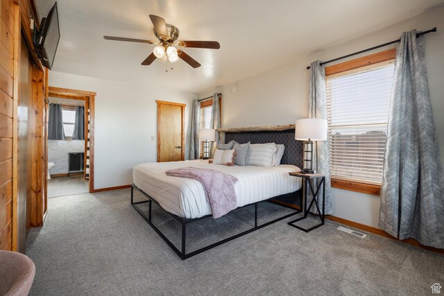 9742 S Crk 29, Duchesne, UT 84021 - carpeted bedroom featuring baseboards, visible vents, ceiling fan, and multiple windows