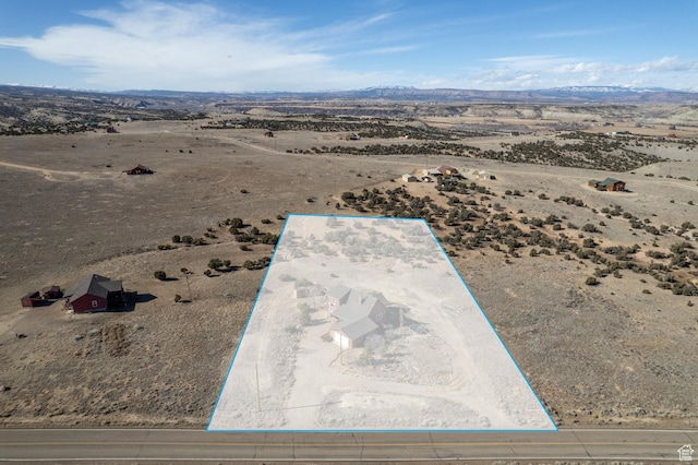 9742 S Crk 29, Duchesne, UT 84021 - aerial view featuring a rural view, view of desert, and a mountain view