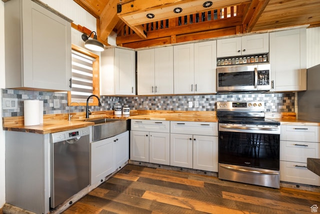 9742 S Crk 29, Duchesne, UT 84021 - kitchen featuring butcher block countertops, dark wood-style flooring, stainless steel appliances, and a sink