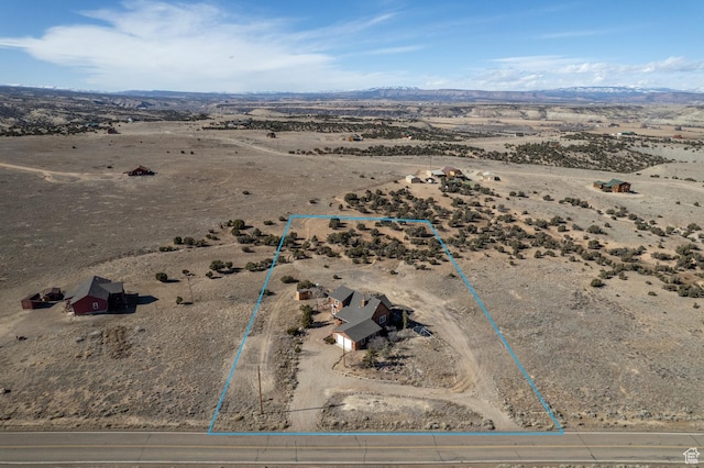 9742 S Crk 29, Duchesne, UT 84021 - drone / aerial view featuring a rural view, view of desert, and a mountain view