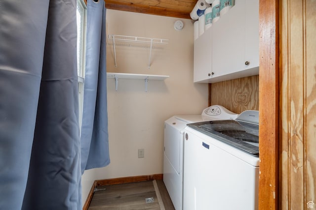 9742 S Crk 29, Duchesne, UT 84021 - laundry area featuring washer and dryer, baseboards, cabinet space, and wood finished floors