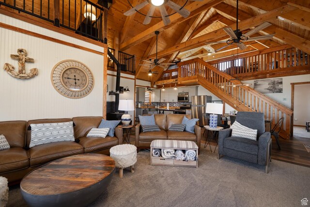 9742 S Crk 29, Duchesne, UT 84021 - living room with high vaulted ceiling, a ceiling fan, stairs, and beamed ceiling