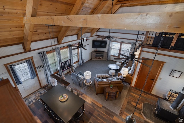 9742 S Crk 29, Duchesne, UT 84021 - living room featuring vaulted ceiling with beams, a ceiling fan, wood finished floors, wood ceiling, and a fireplace