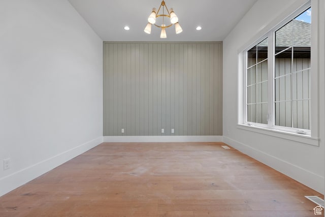 310 S Autumn Blaze Cir, Woodland Hills, UT 84653 - empty room with an inviting chandelier and light wood-type flooring