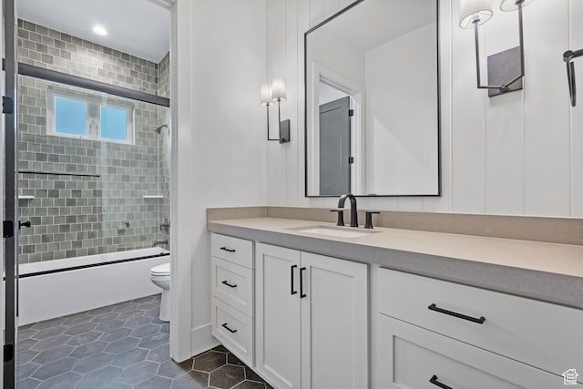 310 S Autumn Blaze Cir, Woodland Hills, UT 84653 - full bathroom featuring vanity, combined bath / shower with glass door, tile patterned floors, and toilet