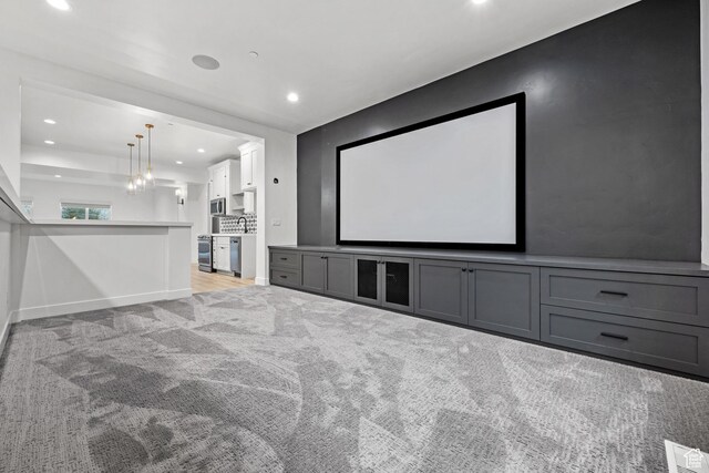 310 S Autumn Blaze Cir, Woodland Hills, UT 84653 - carpeted cinema with a notable chandelier