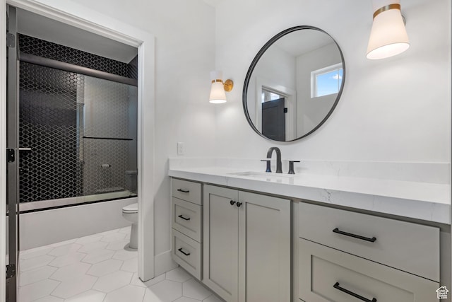 310 S Autumn Blaze Cir, Woodland Hills, UT 84653 - full bathroom featuring enclosed tub / shower combo, vanity, tile patterned floors, and toilet