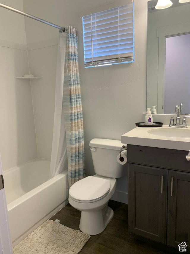 4694 E Lake Corner Dr, Eagle Mountain, UT 84005 - bathroom with shower / bathtub combination with curtain, toilet, wood finished floors, and vanity