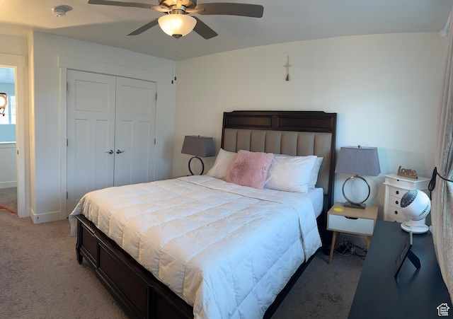 4694 E Lake Corner Dr, Eagle Mountain, UT 84005 - bedroom featuring a closet, light colored carpet, baseboards, and ceiling fan