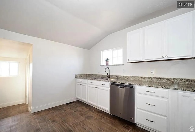 kitchen featuring sink, dishwasher, stone counters, white cabinetry, and dark hardwood / wood-style floors