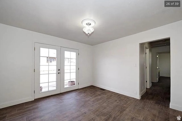 doorway to outside with french doors and dark hardwood / wood-style flooring