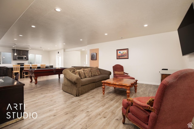 429 W Olympic Ln, Elk Ridge, UT 84651 - living room with billiards, baseboards, a textured ceiling, light wood-type flooring, and recessed lighting