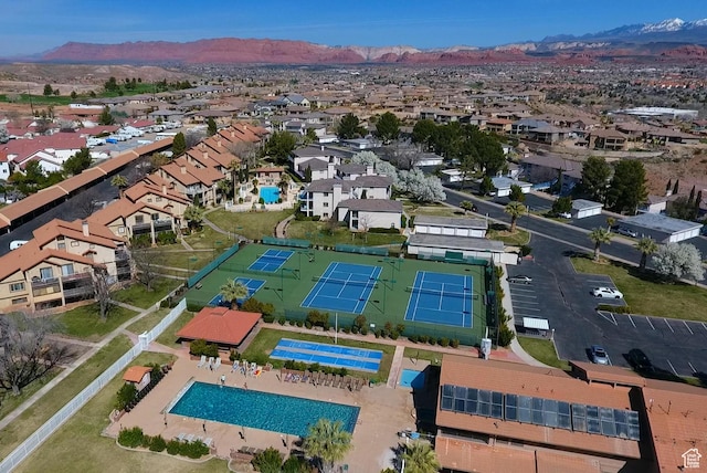 birds eye view of property featuring a mountain view