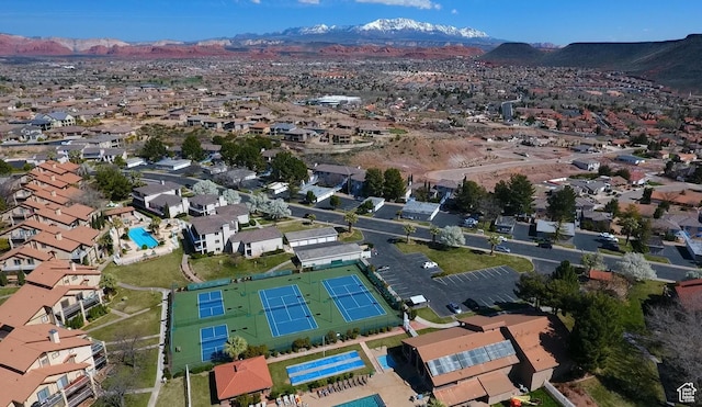 birds eye view of property featuring a mountain view