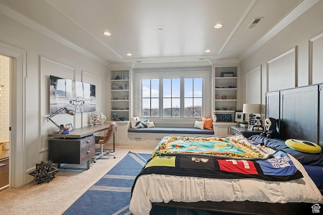 bedroom with crown molding and light colored carpet