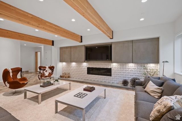 living room with beamed ceiling