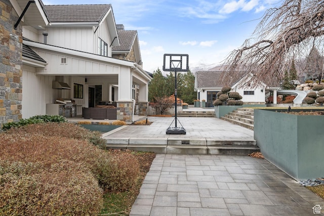 view of patio / terrace featuring an outdoor living space and grilling area