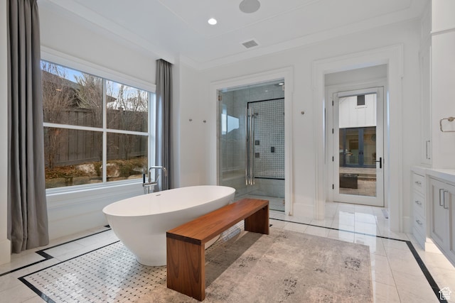bathroom featuring ornamental molding, vanity, shower with separate bathtub, and tile patterned flooring