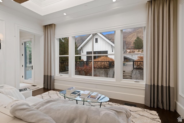 living area featuring dark hardwood / wood-style floors