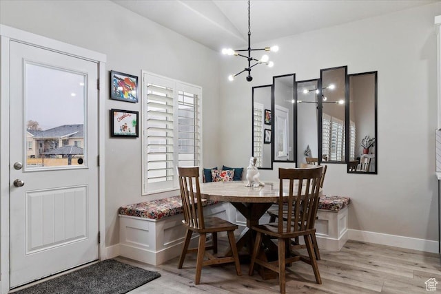 7160 S 1100 E, South Weber, UT 84405 - dining area with an inviting chandelier, light wood-type flooring, and breakfast area