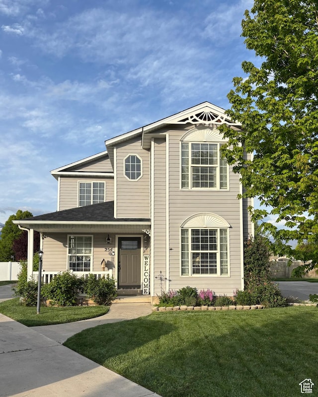 traditional home with a front yard