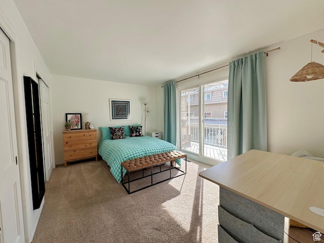 2220 E Murray Holladay Rd Unit 140, Holladay, UT 84117 - bedroom with access to exterior, carpet flooring, and a closet
