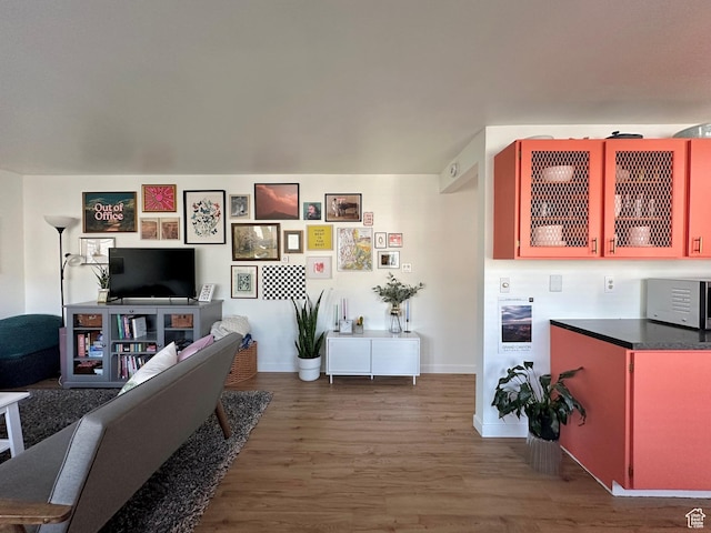 2220 E Murray Holladay Rd Unit 140, Holladay, UT 84117 - living room featuring wood finished floors and baseboards