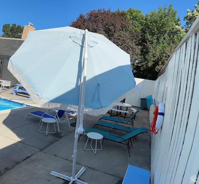 2220 E Murray Holladay Rd Unit 140, Holladay, UT 84117 - fenced backyard featuring a patio