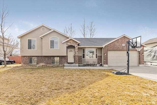 tri-level home with a garage and a front yard