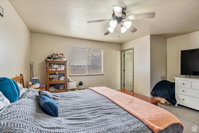 4323 W 25 S, West Point, UT 84015 - carpeted bedroom with ceiling fan and a textured ceiling