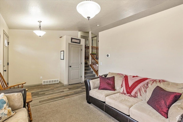 4323 W 25 S, West Point, UT 84015 - living room with vaulted ceiling, dark hardwood / wood-style floors, and a textured ceiling