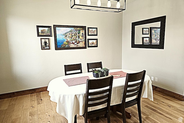 1532 W 3500 N, Pleasant Grove, UT 84062 - dining area with wood-type flooring and baseboards