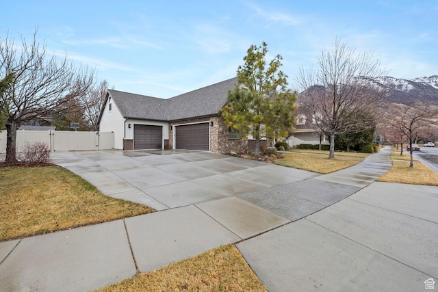 1532 W 3500 N, Pleasant Grove, UT 84062 - view of front of home with a gate, a garage, driveway, roof with shingles, and stone siding
