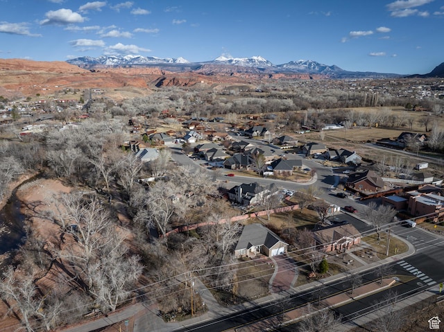 567 S 400 E, Moab, UT 84532 - aerial view of property and surrounding area with a mountainous background and nearby suburban area