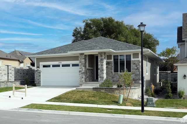 2998 N 1080 W, Lehi, UT 84043 - view of front of property featuring stone siding, a garage, concrete driveway, and fence