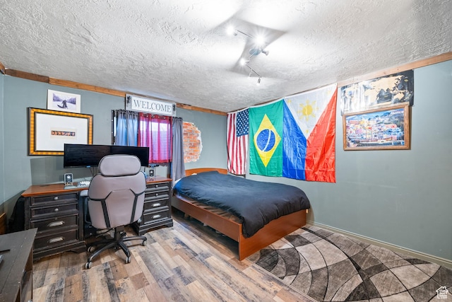 2283 E 7925 S, South Weber, UT 84405 - bedroom with baseboards, a textured ceiling, and wood finished floors
